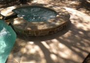 Raised Spa with Flagstone Coping and Veneer